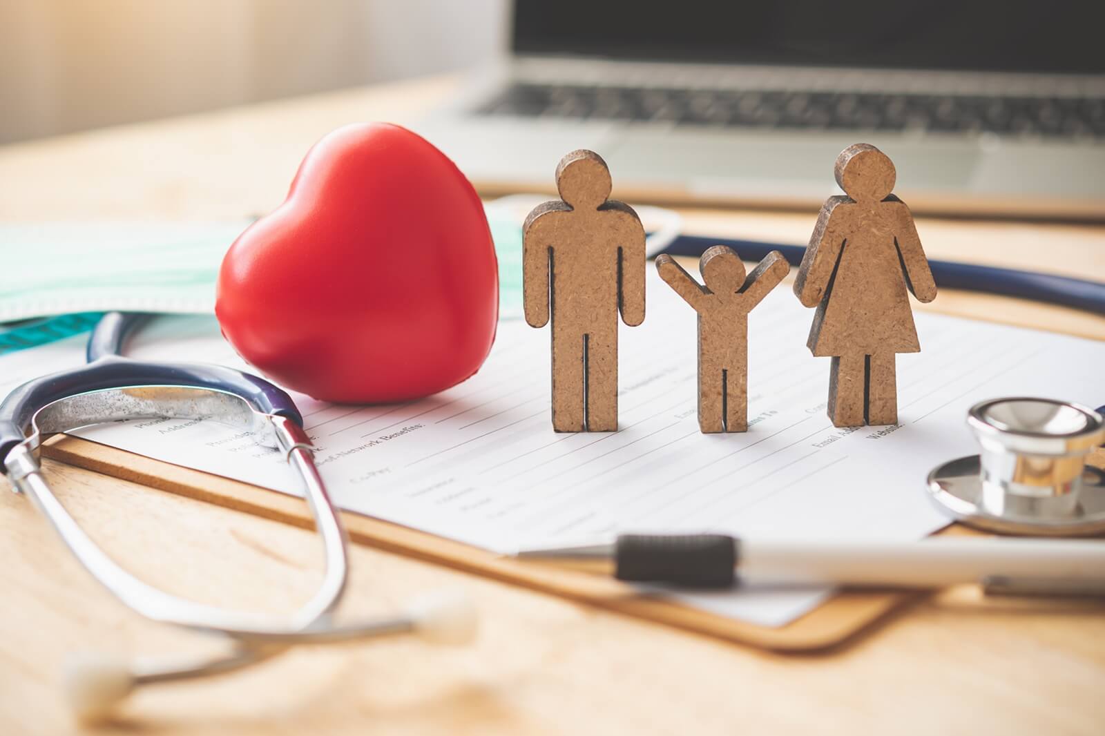 medical insurance concept with family and stethoscope
