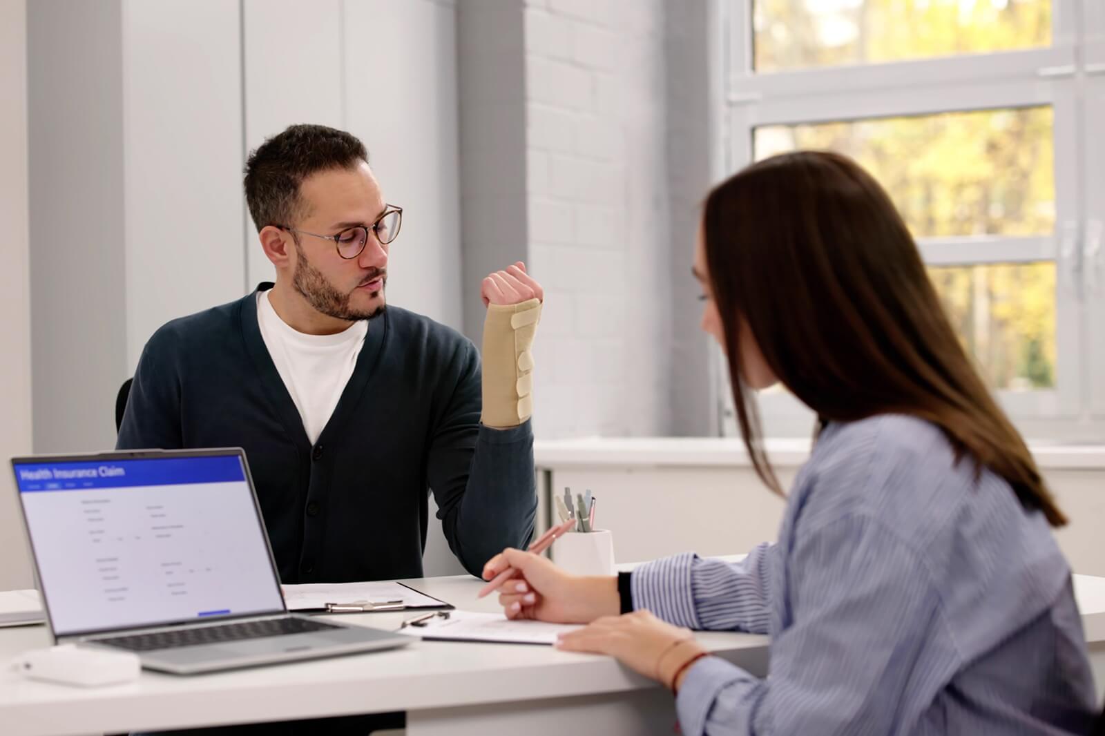 young male worker suffers neck injury