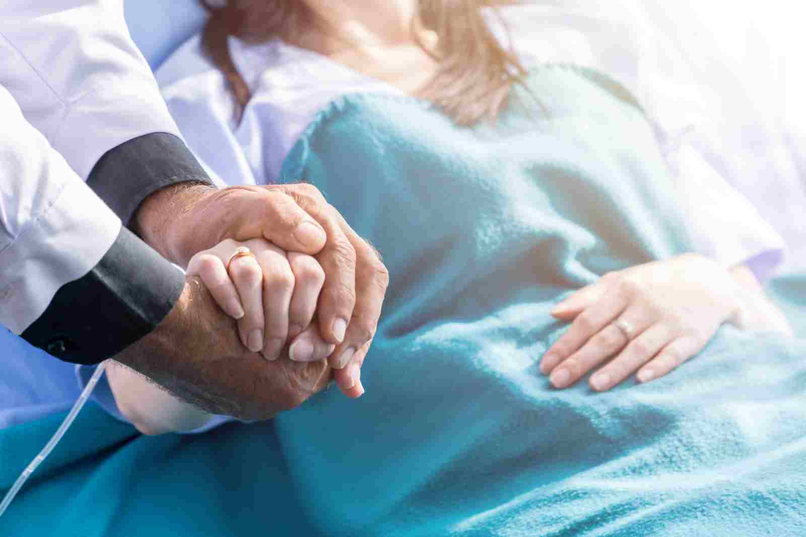 person in hospital needing long-term disability insurance