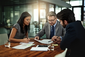 Delivery Business Owners Reviewing Rate Adjustments with Their Agent