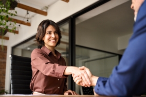 Retail Business Owner Shaking Hand with an Insurance Agent