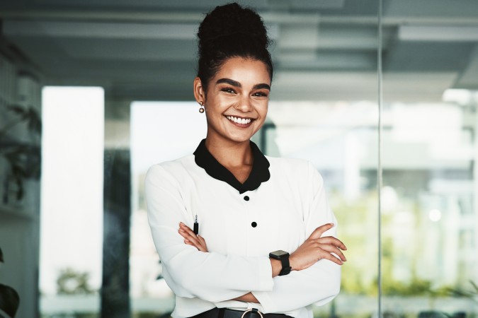 young and smiling insurance agent at the norwalk connecticut office
