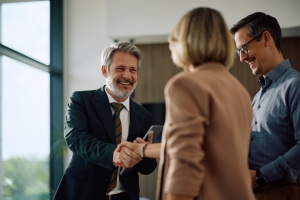 Logistics Business Owners Meeting with Insurance Agent in Office