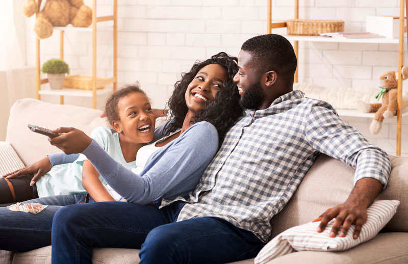family enjoying time after getting coverage from JMG