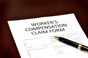 Workers Compensation Claim Form with Pen